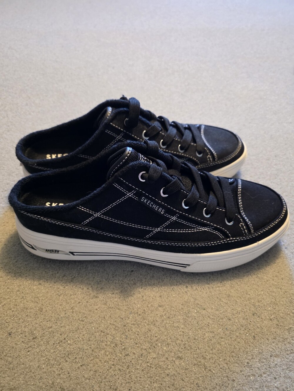 Skechers Women’s Black Low-Top Lace-Up Sneakers with White Sole